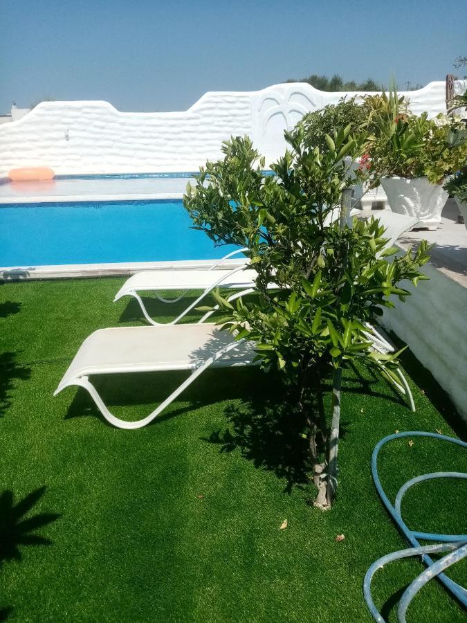 Rose Garden Apartments Pigí Buitenkant foto