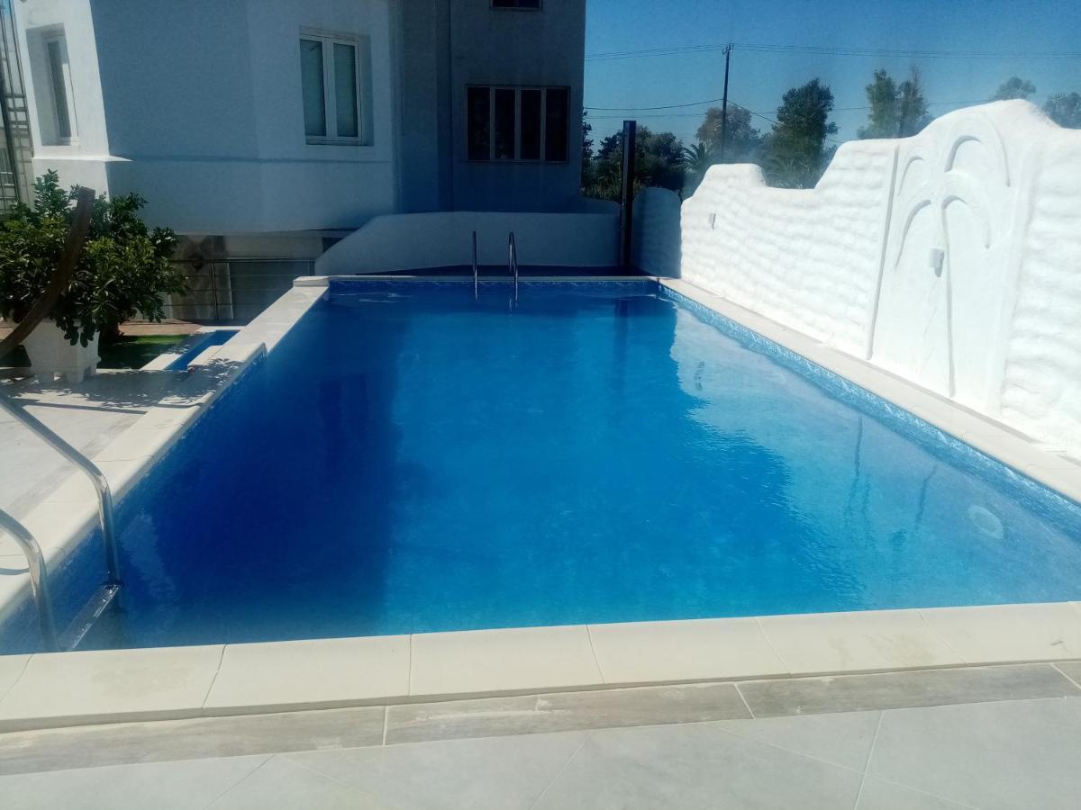 Rose Garden Apartments Pigí Buitenkant foto